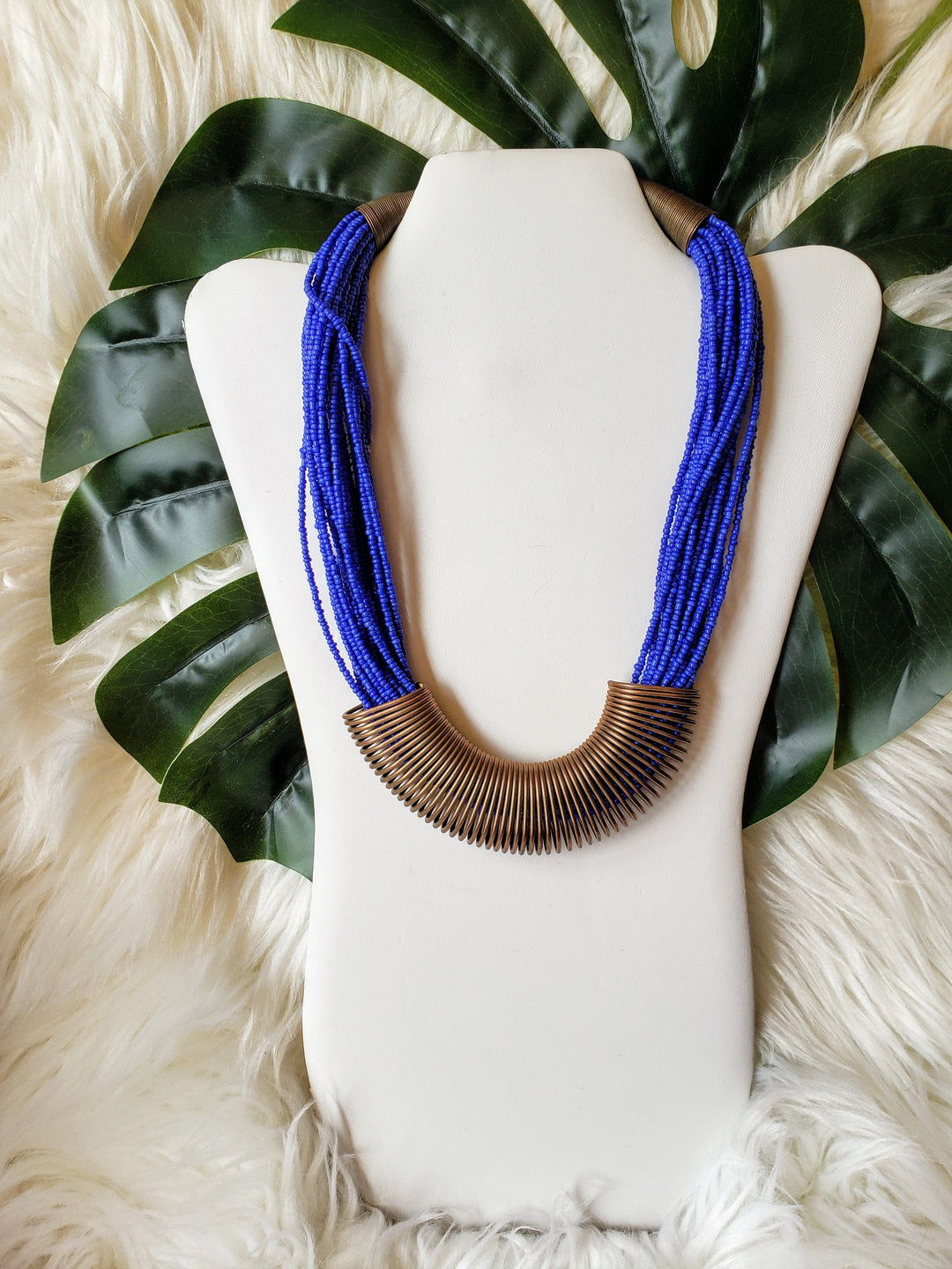 blue beaded and brass necklace